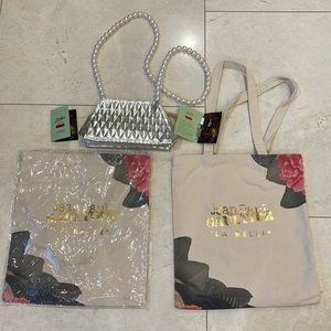 Jean Paul Gaultier Canvas Beach Bags and silver cosmetics bag.